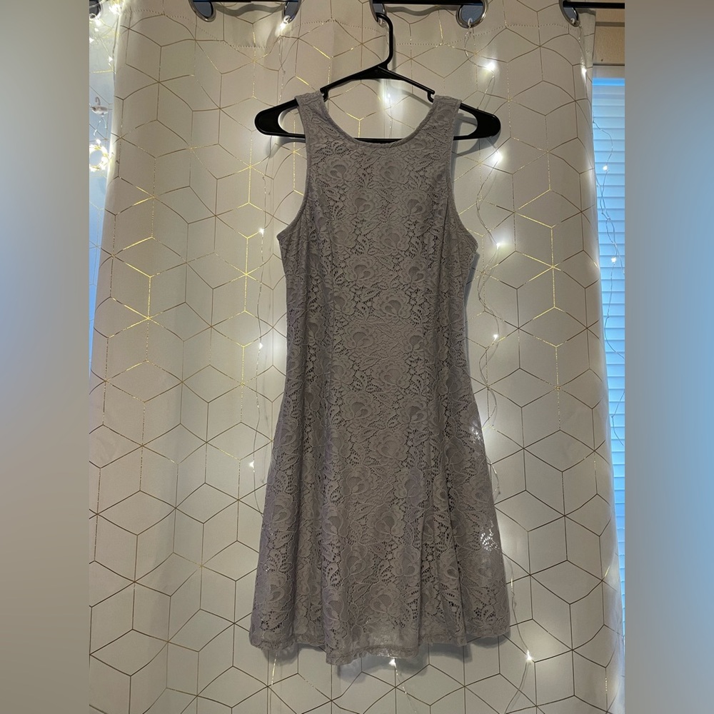 Very comfortable, purple/grey dress. Adorable bow in the back and cozy fit! Lace